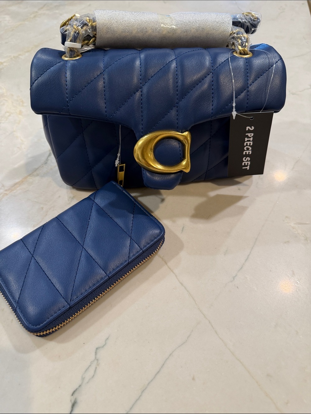 Inspired PU blue handbag. Gold hardware